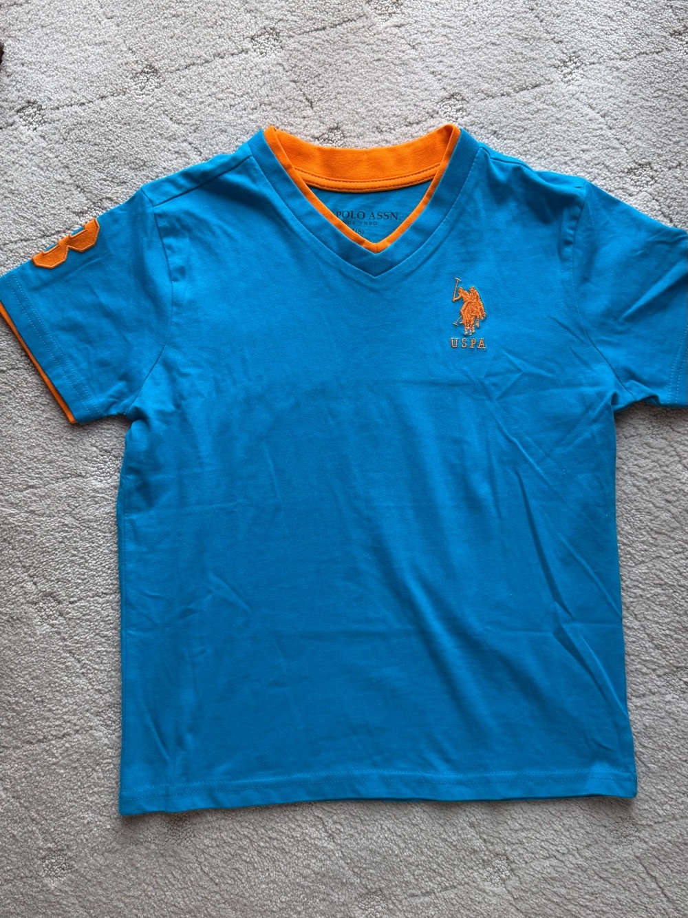 New U.S. Polo Assn. Boys' Blue V-Neck Polo Tee with Orange Trim sz M(8)